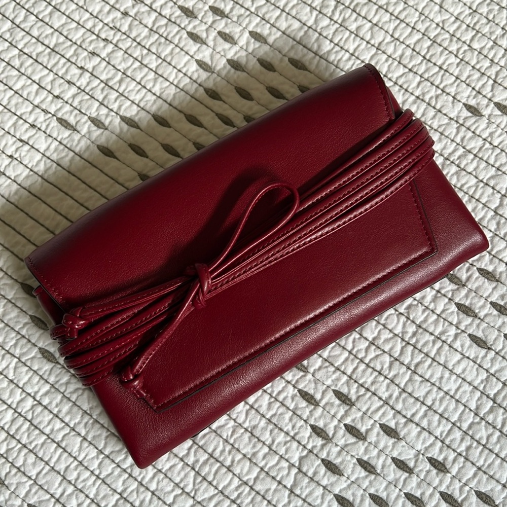 Stuart Weitzman - Mini Black Tie Clutch - Red